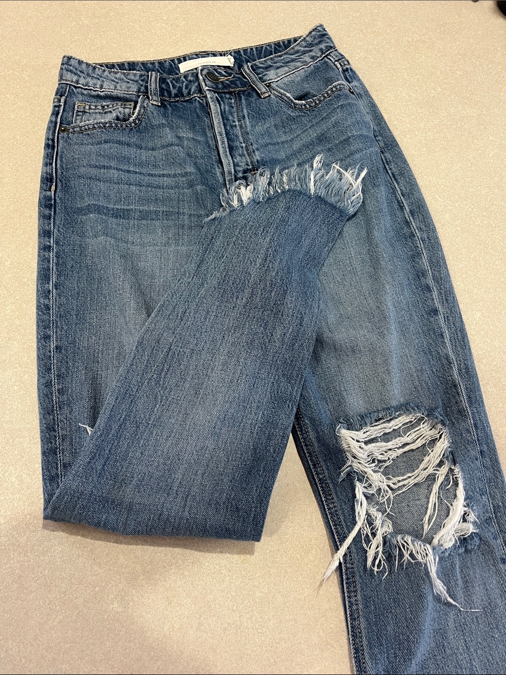 Hidden distressed straight ruff hem asymmetrical